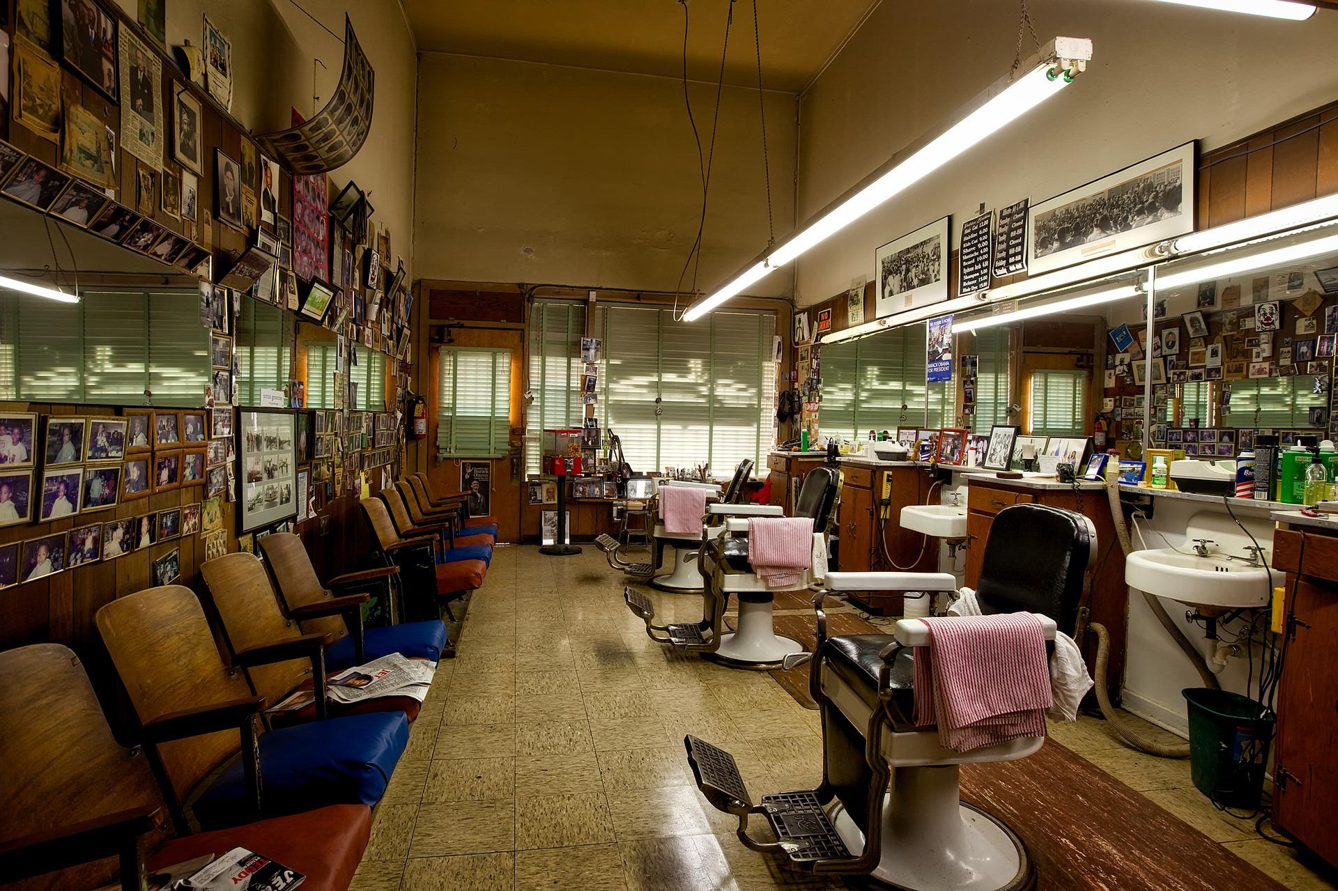 empty barbershop with barber chairs